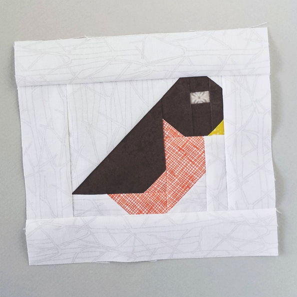 Bird quilt block design by Sew Fresh Quilts. Pattern is part of a pattern for a quilted table runner.