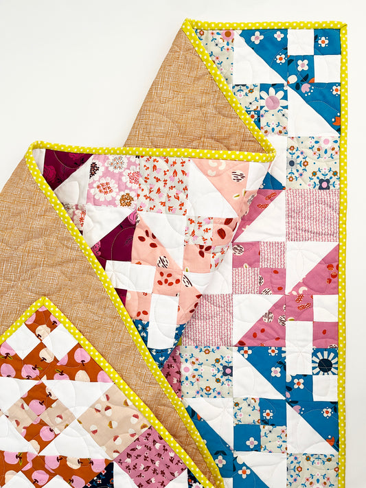 Vintage-inspired patchwork quilt pattern with fat quarter fabrics