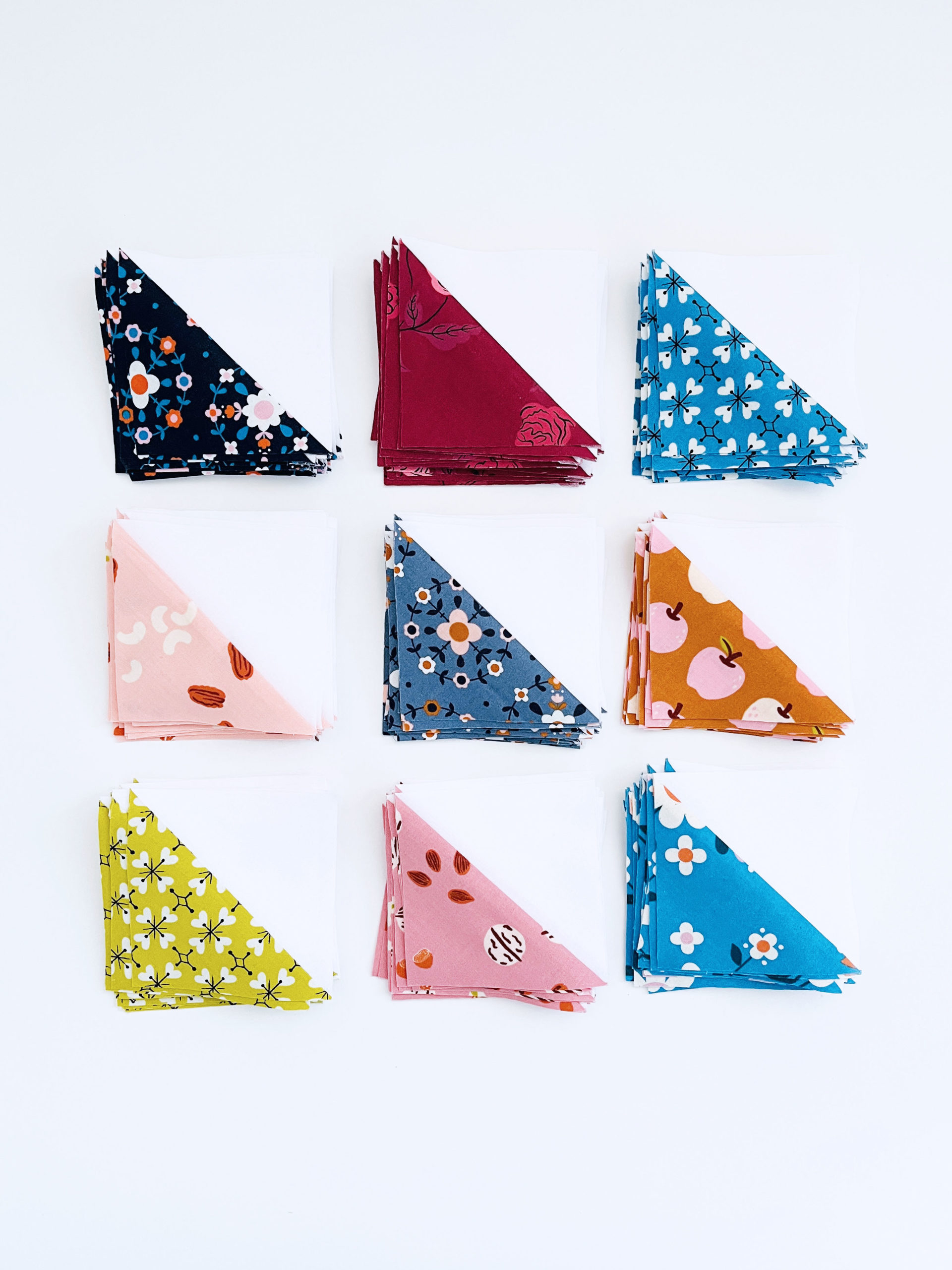 Half square triangles in fabric by Kimberly Kight